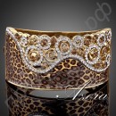Браслет в виде манжеты леопардовой расцветки с австрийскими кристаллами Stellux в настоящей позолоте