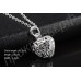 Блистательный ювелирный комплект из ожерелья и сережек в форме ажурного сердечка в прекрасном посеребрении