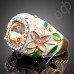 Замечательное кольцо в виде бежевого цветка с зелеными листьями с австрийским кристаллом Stellux в настоящей позолоте  