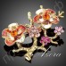Элегантная брошь в виде цветущей сливы с австрийскими кристаллами Stellux в прекрасной позолоте